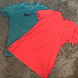 2 workout shirts. Ones adidas and Nike.
